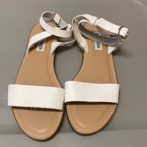 Steve Madden flat white sandals.